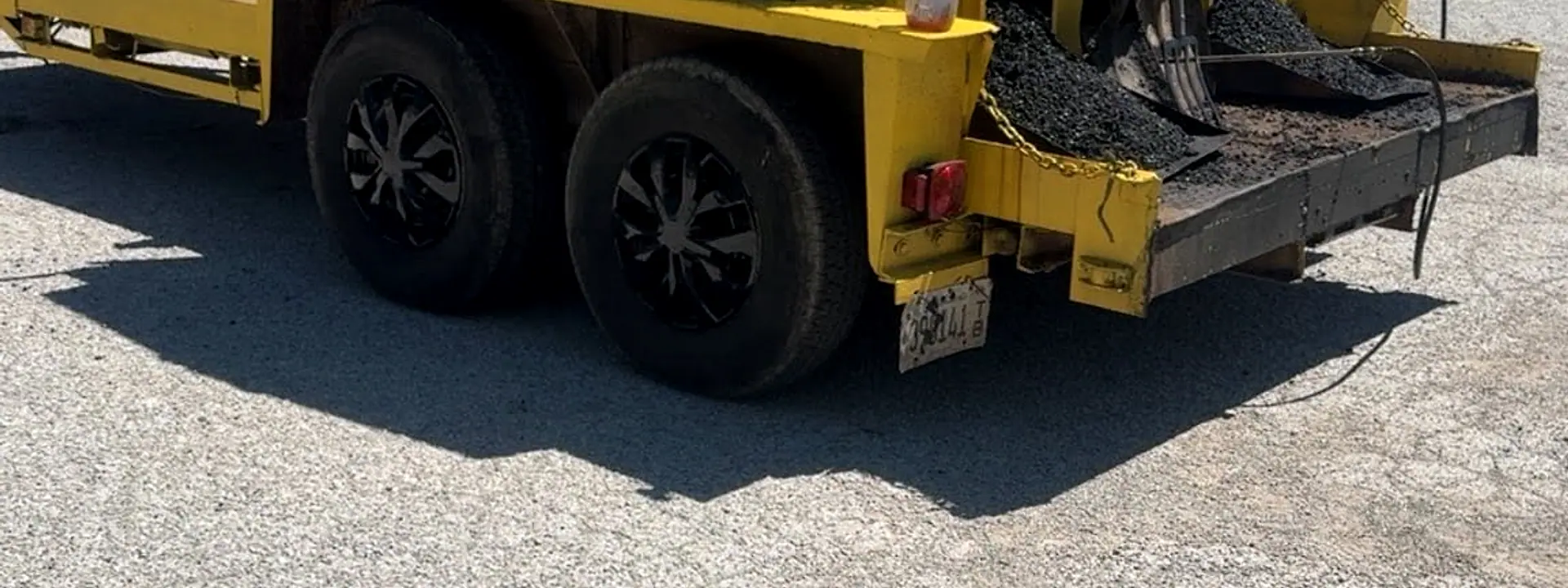 Campbell's yellow branded trailer — Work Hard, Stay Humble